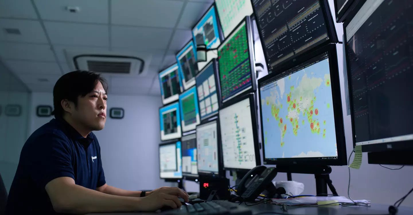 Singapore
Employee in Singapore Satellite laboratory reviewing satellite positioning data