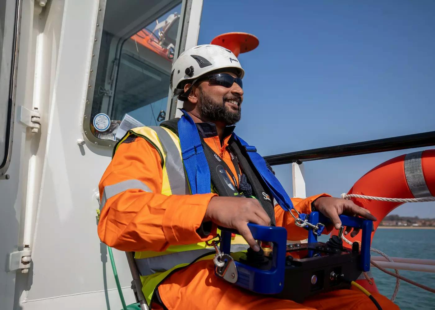 Fugro staff member Rahul Pakkath remotely pilots the vessel on a course for the remote USV whilst taking part in a practical training session in the operation of uncrewed surface vessels (USVs) on board the WillChallenge on Southampton Water. 
-
Fugro Middle East personnel have completed the world's first Maritime Autonomous Surface Systems (MASS) professional certified training delivered by SeaBot XR at their training academy CEbotiX, the National Centre for Operational Excellence in Marine Robotics based in Southampton, UK.