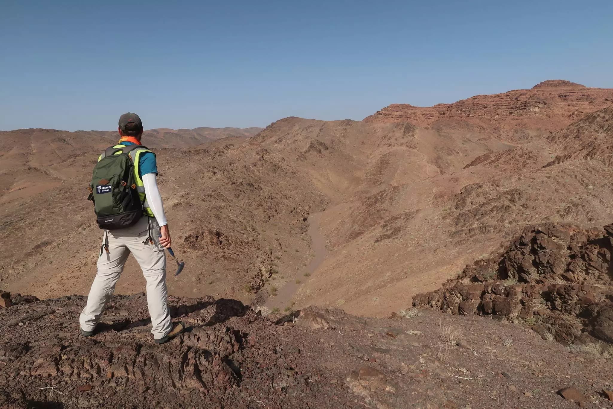 Employee undertaking geologic mapping 01.jpg